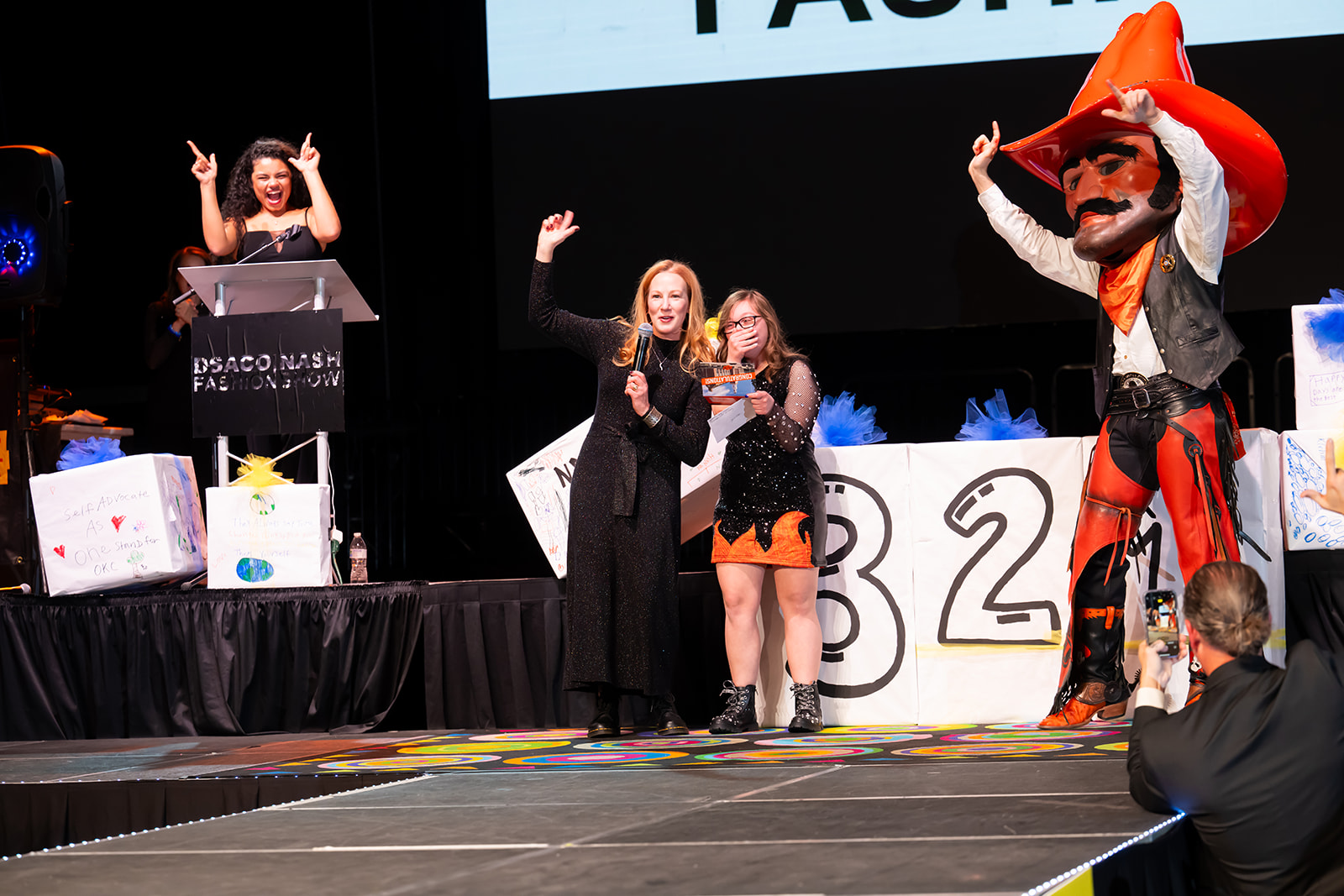 Josie, Dr. Jones and Pistole Pete celebrate with Pistols Firing Josie, Dr. Jones and Pistole Pete celebrate with Pistols Firing