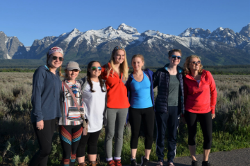 Students in front of mountain