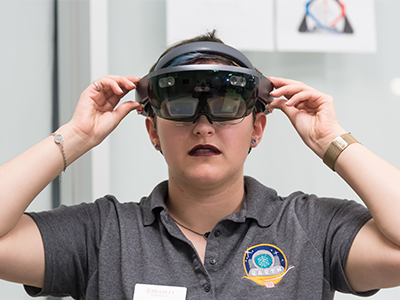 student with virtual reality glasses