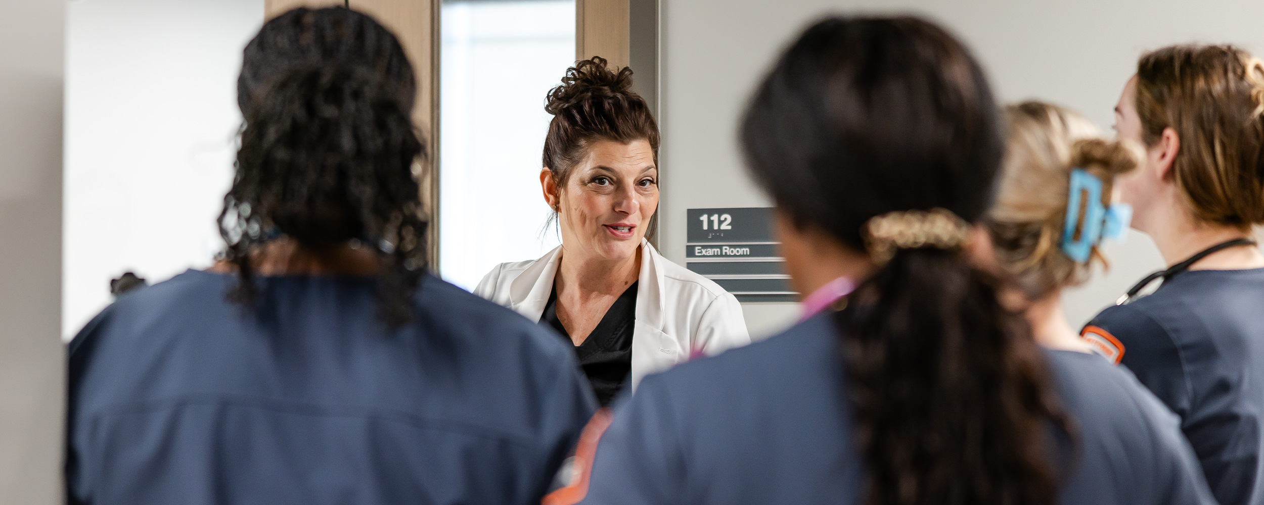 Nurse leader speaking to nursing students