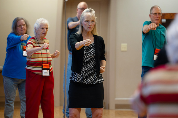 OLLI members participating in Tai Chi class.