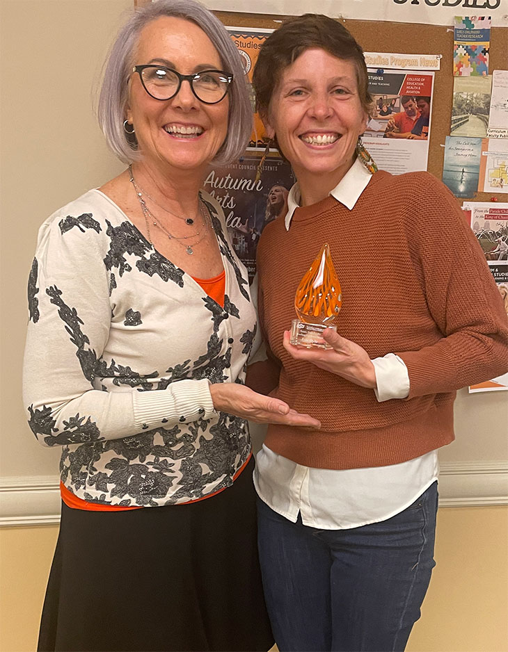 Dr. Erin Dyke is presented with award