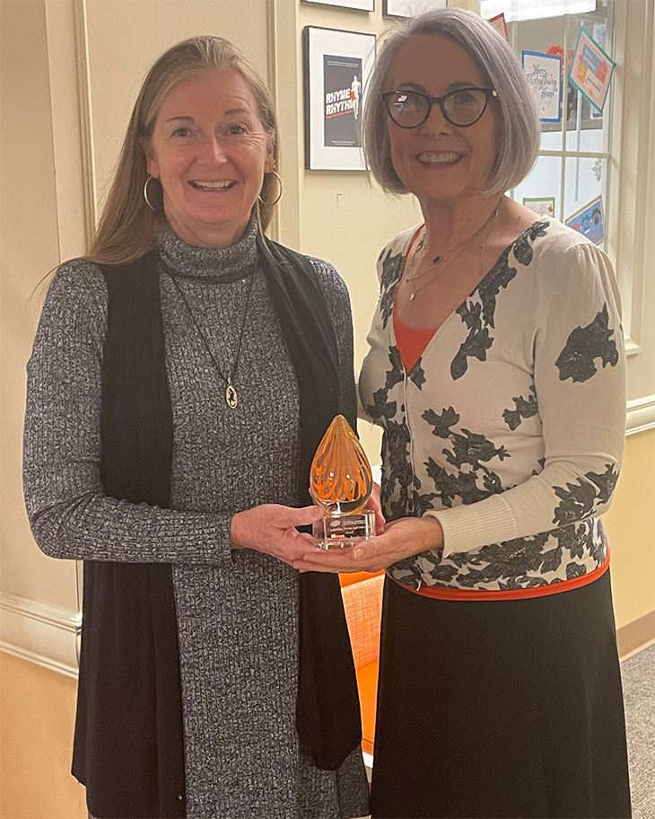 Dr. Julie Angle is presented with award