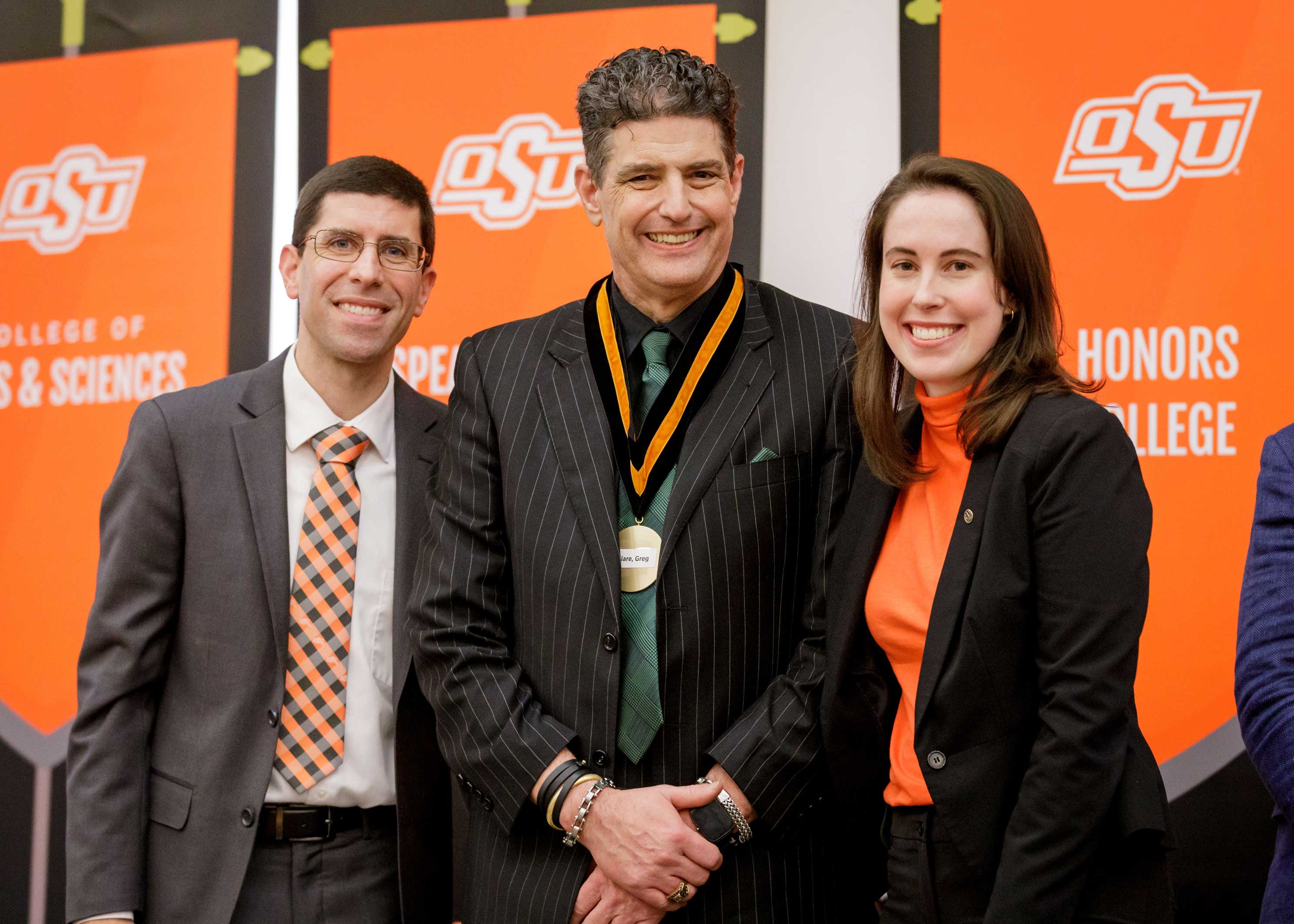 Dr. Greg Clare receives award. 