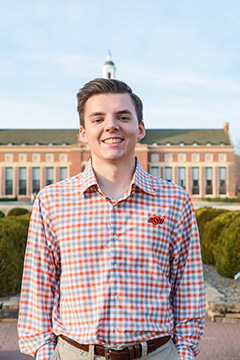 A professional portrait of Cody Moss.