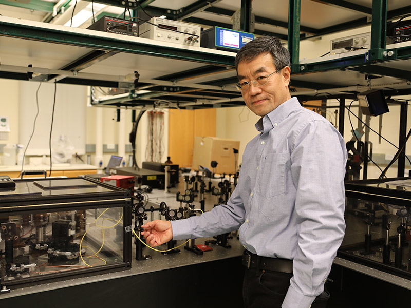 Dr. Zhang in lab