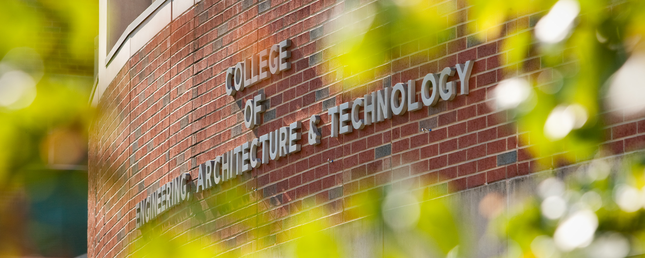 Photo of College of Engineering, Architecture and Technology signage.