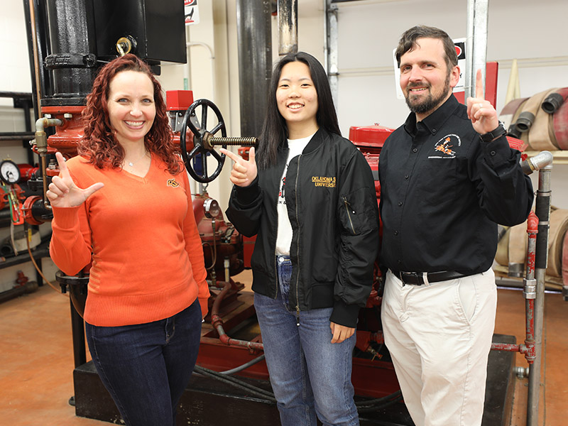 Dr. Charter, Dr. Hosking and Anna Zhang show OSU spirit at the FPSET lab.