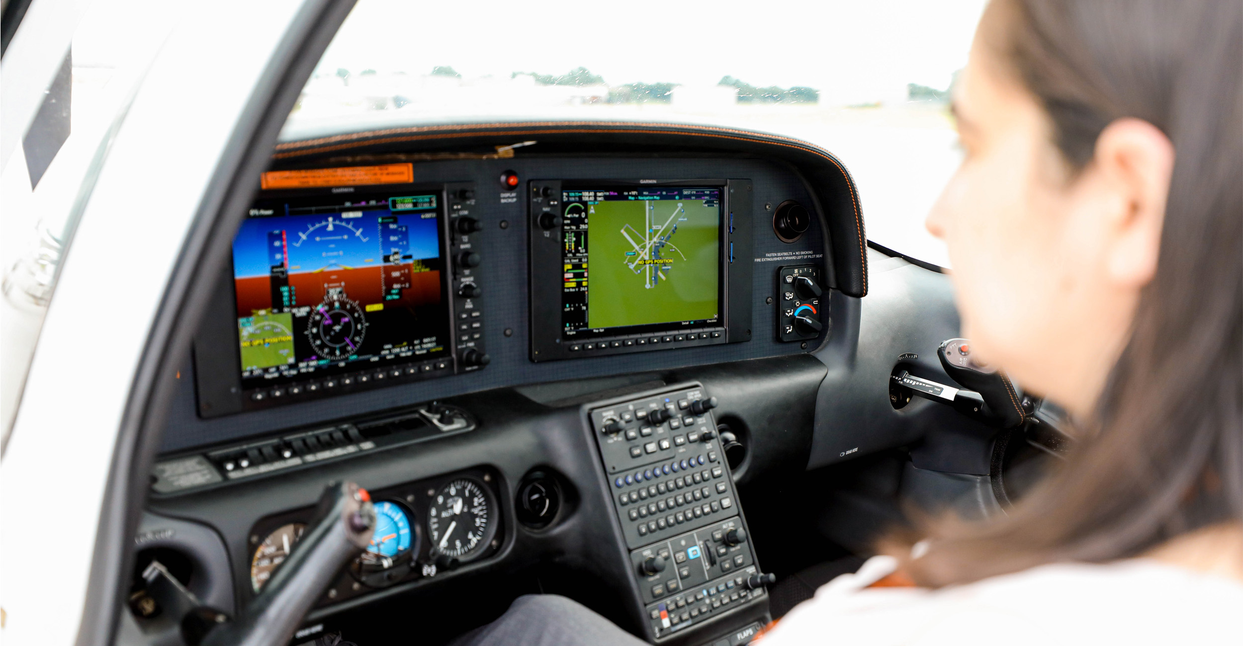 Dr. Nicoletta Fala, Mechanical and Aerospace Engineering professor and researcher in a Cirrus SR-20L.