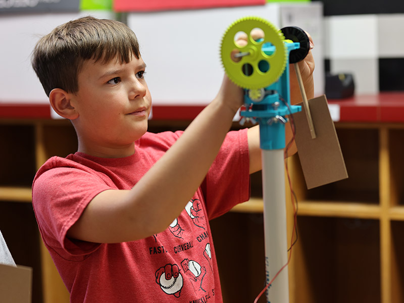 elementary school student learning about wind energy