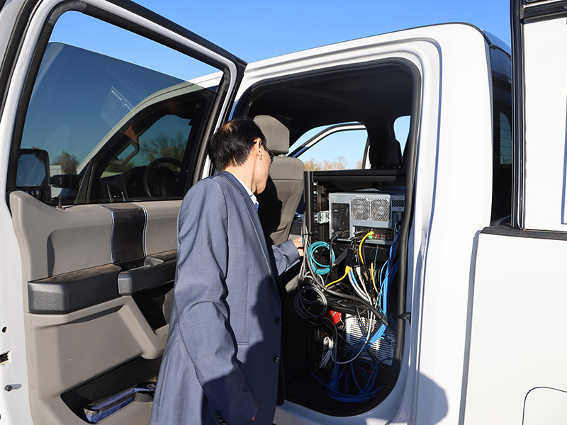 Dr. Joshua Li preps to do field testing
