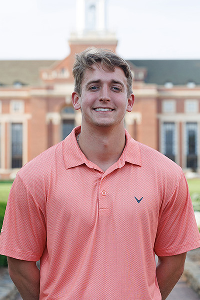 Reese Huhnke, a student in the College of Engineering, Architecture and Technology, was named a Top 20 Freshmen for Oklahoma State University. He is pictured with the OSU library in the background.