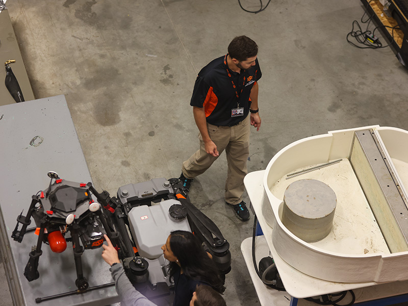 An aerial view of the water tank and agricultural drone in Dr. Comer's S2FAR lab.