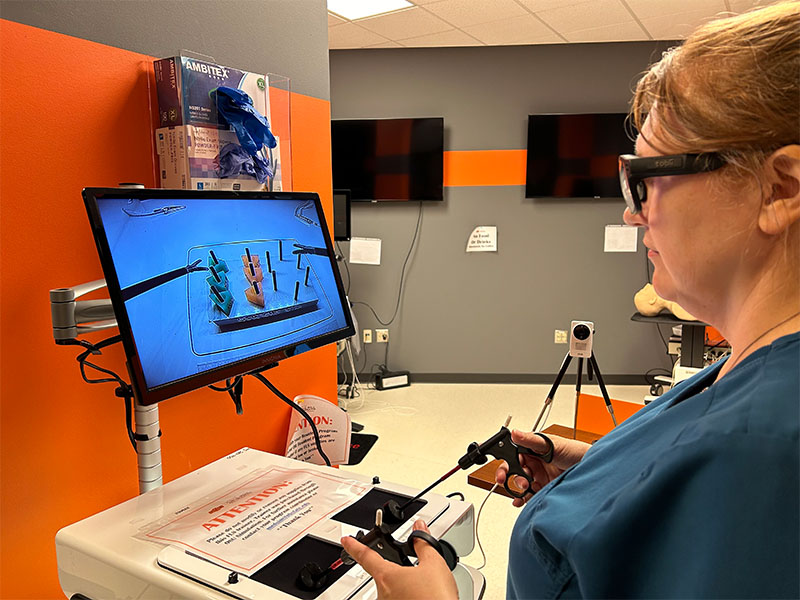 An individual works on developing research to derive and codify repeatable sets of actions to perform medical actions.