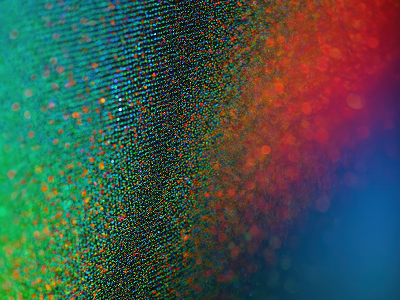 Macro photo of detailed colorful OLED monitor screen.