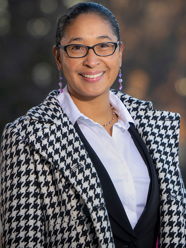 A woman poses for a professional headshot.