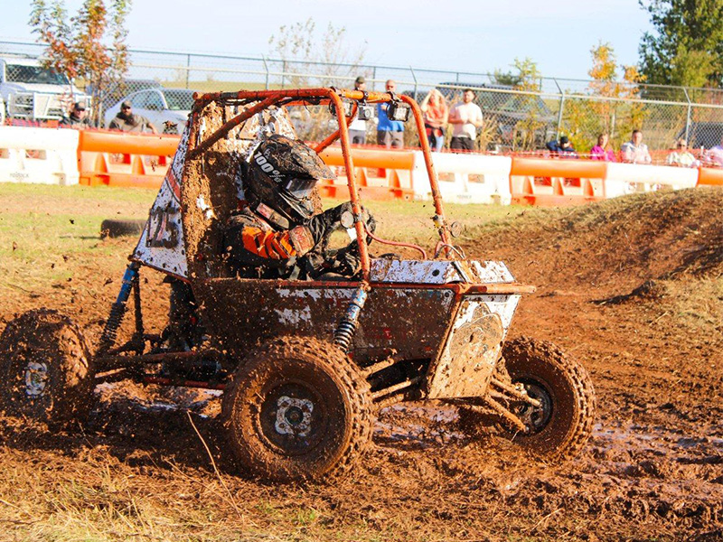 A Baja SAE racecar in mud