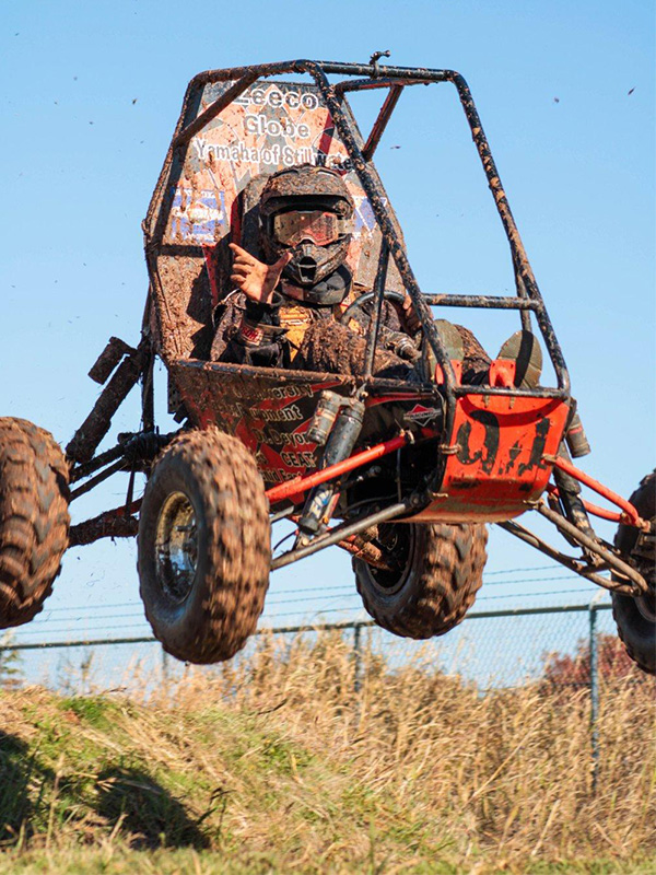 A Baja SAE racecar mid jump