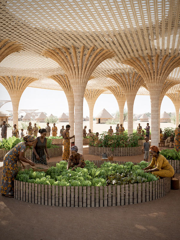 Community members tend vegetable gardens beneath a large shaded canopy supported by tree-shaped columns in a sustainable agricultural space.