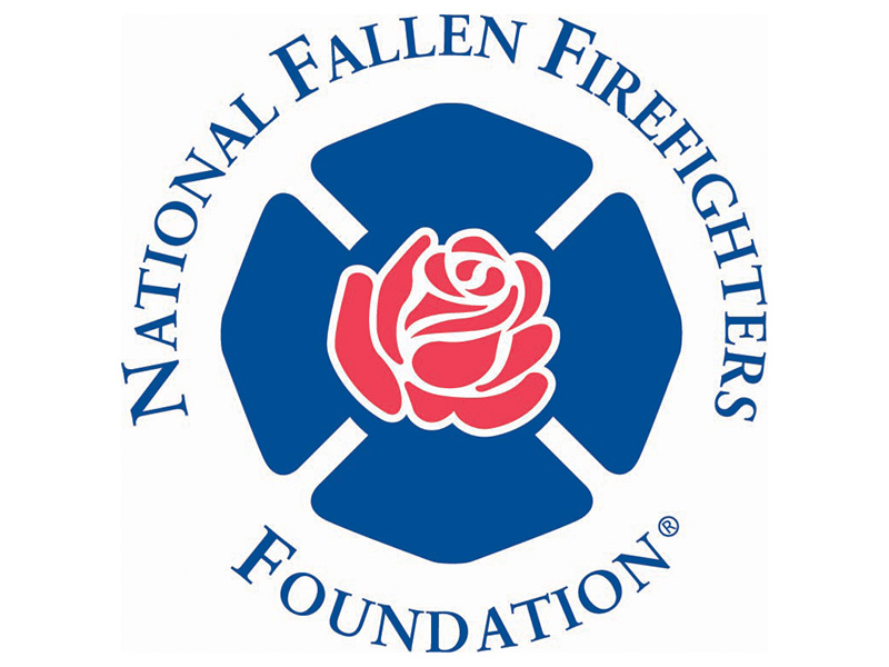 Circular logo of the National Fallen Firefighters Foundation with blue text forming a ring around a blue Maltese cross. A red rose with a white outline sits in the center of the cross.