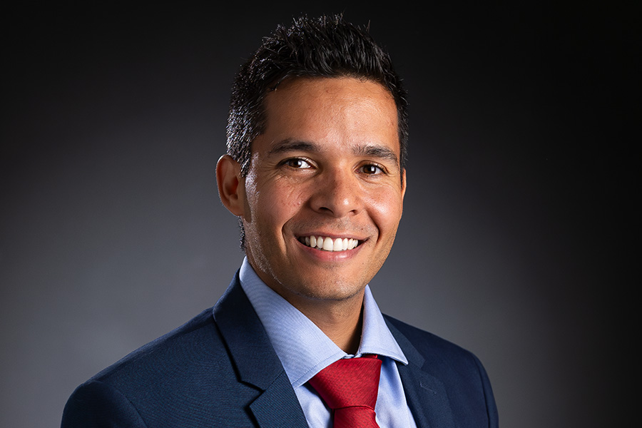 Professional portrait of Dr. Gabriel Perez in a suit and tie.