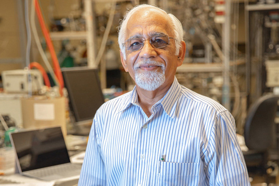 Dr. Raj Singh stands in his lab