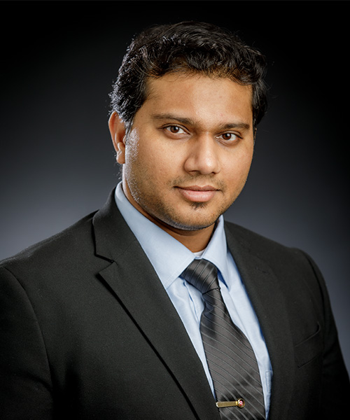 Dr. Ritesh Sachan is shown in a suit and tie for his faculty portrait as an associate professor at Oklahoma State University.