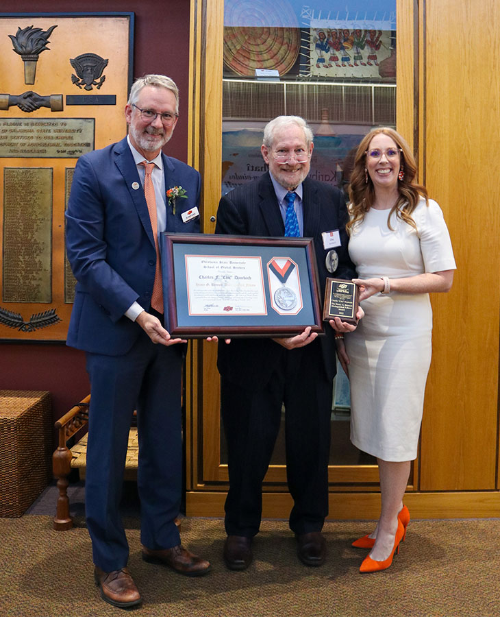 Chic Dambach recieving the Henry G. Bennett Distinguished Fellow award