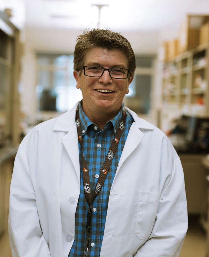 Biomedical Sciences doctoral student Christy Eslinger, in the lab where she works at OSU Center for Health Sciences.