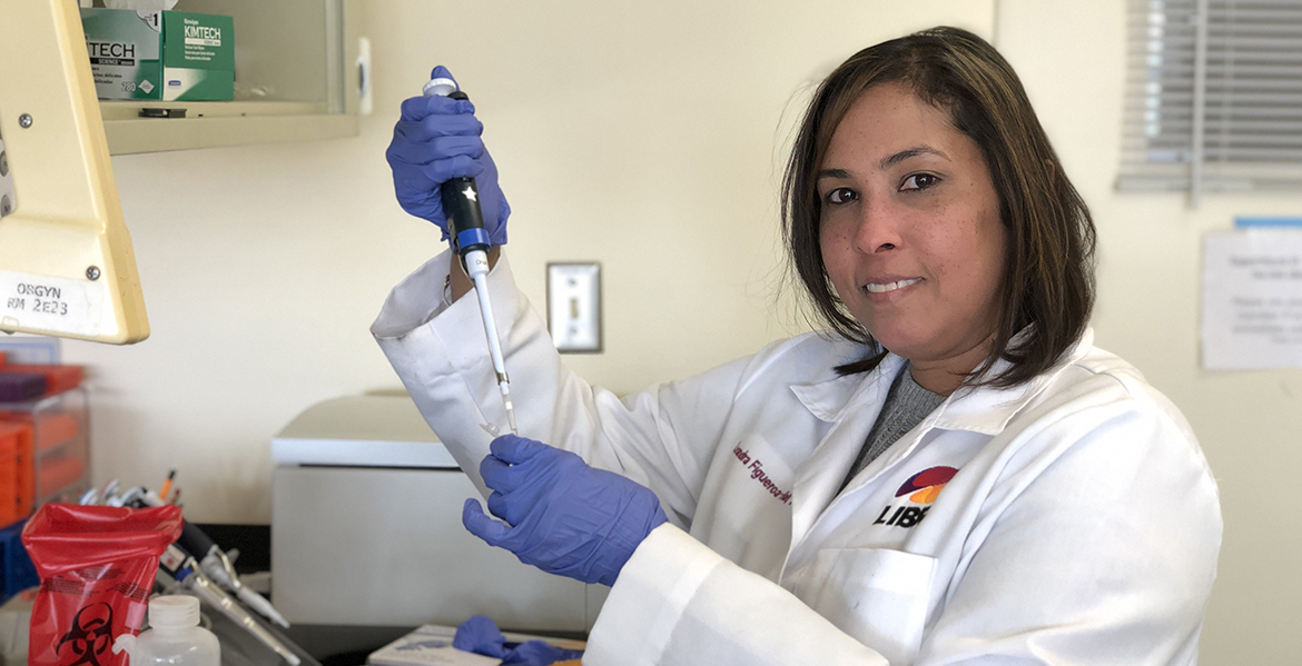Leandra Figueroa-Hall working in the lab for Laureate Institute for Brain Research.