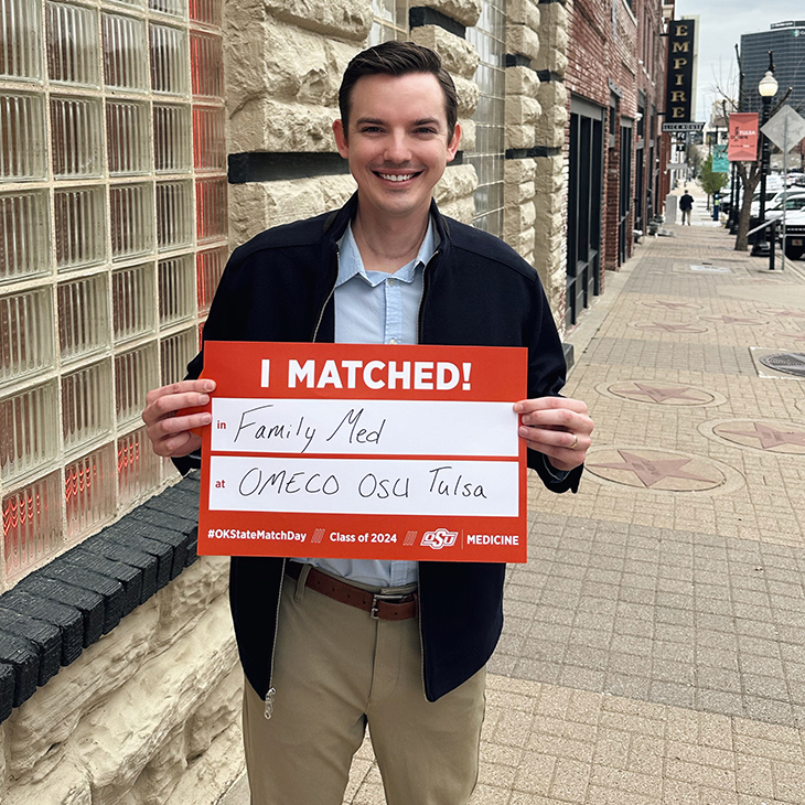 Brandon Garner celebrating his OSU Medicine family medicine match on Match Day in March 2024