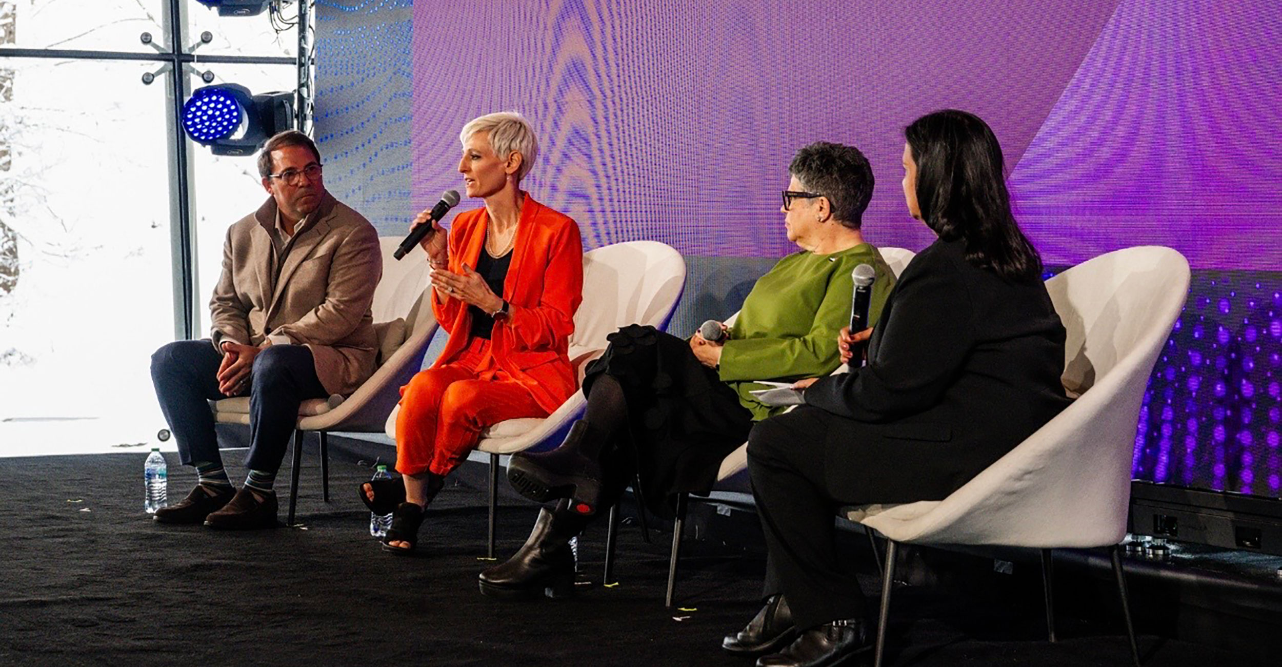 Steve Mackin, left, president and CEO Mercy Health Systems; Dr. Natasha Bray, dean of OSU College of Osteopathic Medicine at the Cherokee Nation; Yogi Hernandez Suarez, executive vice dean and professor at Alice L. Walton School of Medicine; and Sharmila Makhija, founding dean and CEO of Alice L. Walton School of Medicine, speak at the first Think Health: AI for Healthy Communities Conference in Bentonville, Arkansas on January 10, 2025.