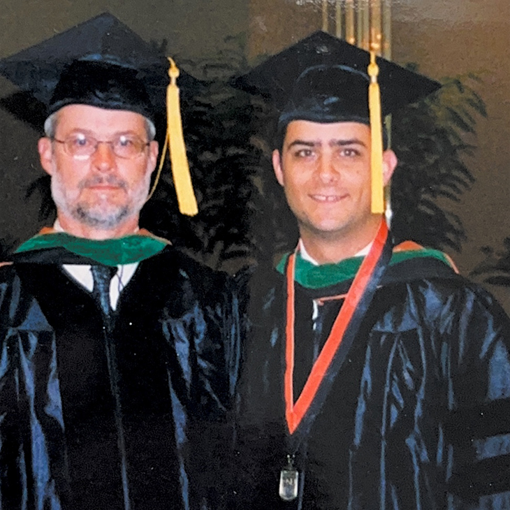 Dr. Mark Callery, right, stands with his father, Dr. Mike Callery, after Mark's graduation from OSU College of Osteopathic Medicine in 2003.