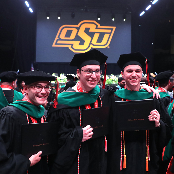 OSU-COM graduates take a photo following commencement ceremony