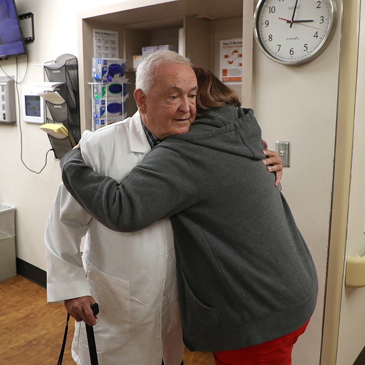Dr. James Graham hugs a nurse at Rural Wellness Fairfax Hospital in Fairfax, Oklahoma.