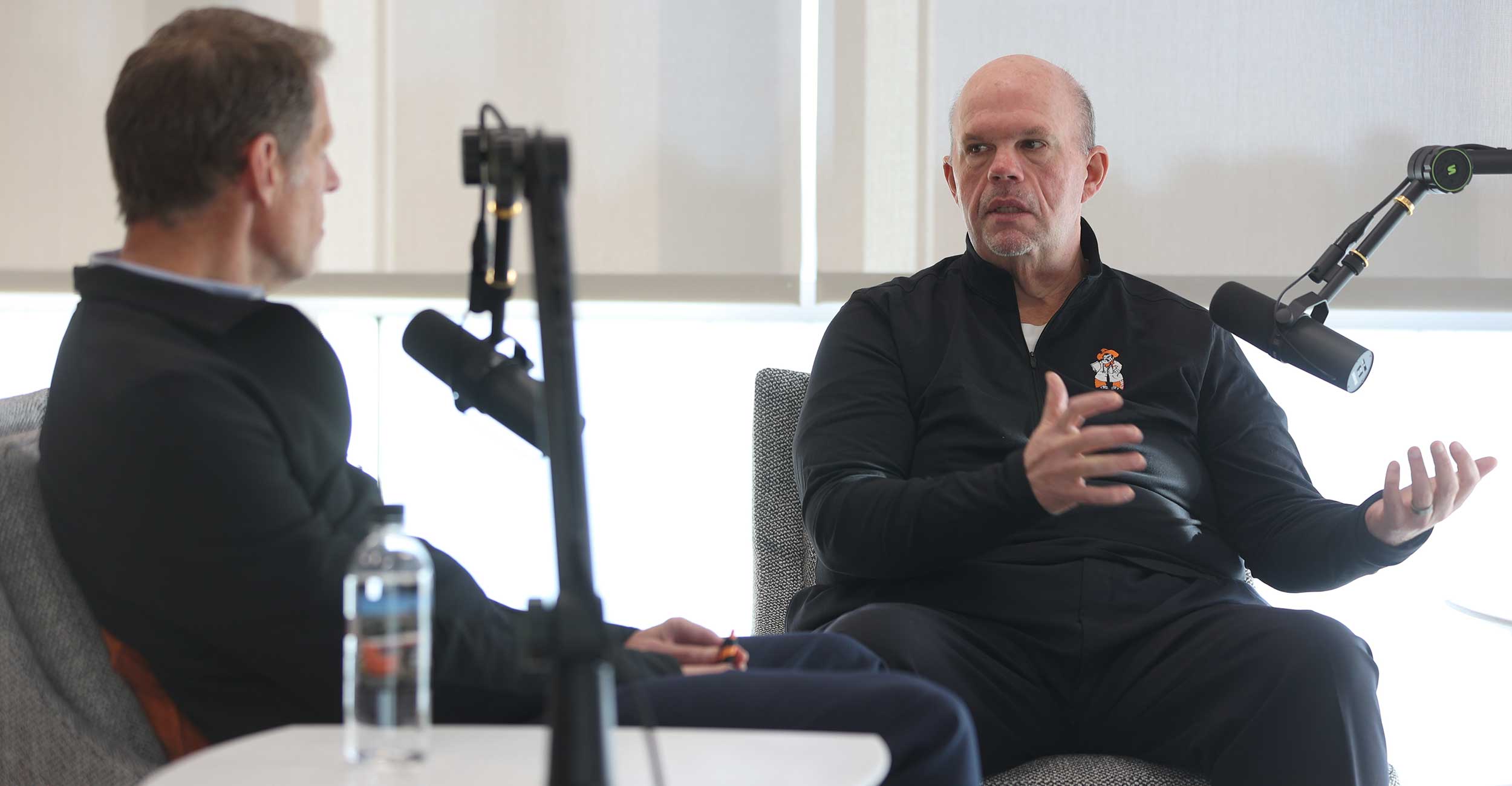 Oklahoma State University President Johnny Stephens sits in his office talking with Dr. Drew Crawford, a Tulsa gastroenterologist and Oklahoma State University College of Osteopathic Medicine alumnus.