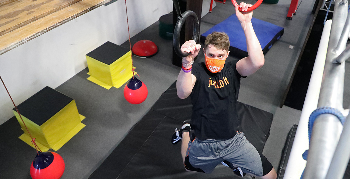 Medical student Cole Verble practices ninja warrior obstacles at Camp Ninja Warrior in Bixby.