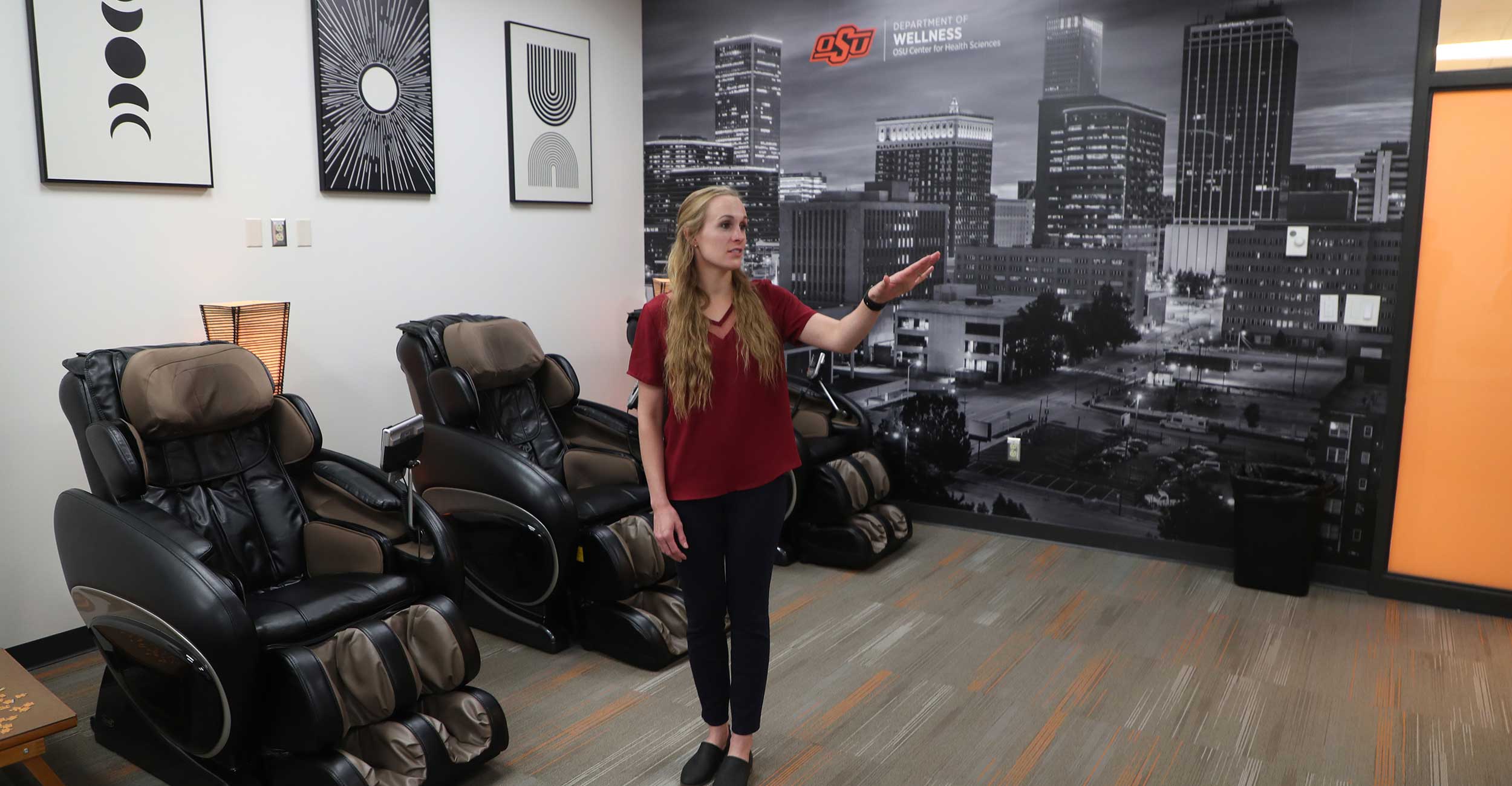 Kelsey Ashwood, employee wellness coordinator, gives a tour of the recently renovated Reboot Center at OSU Center for Health Sciences.