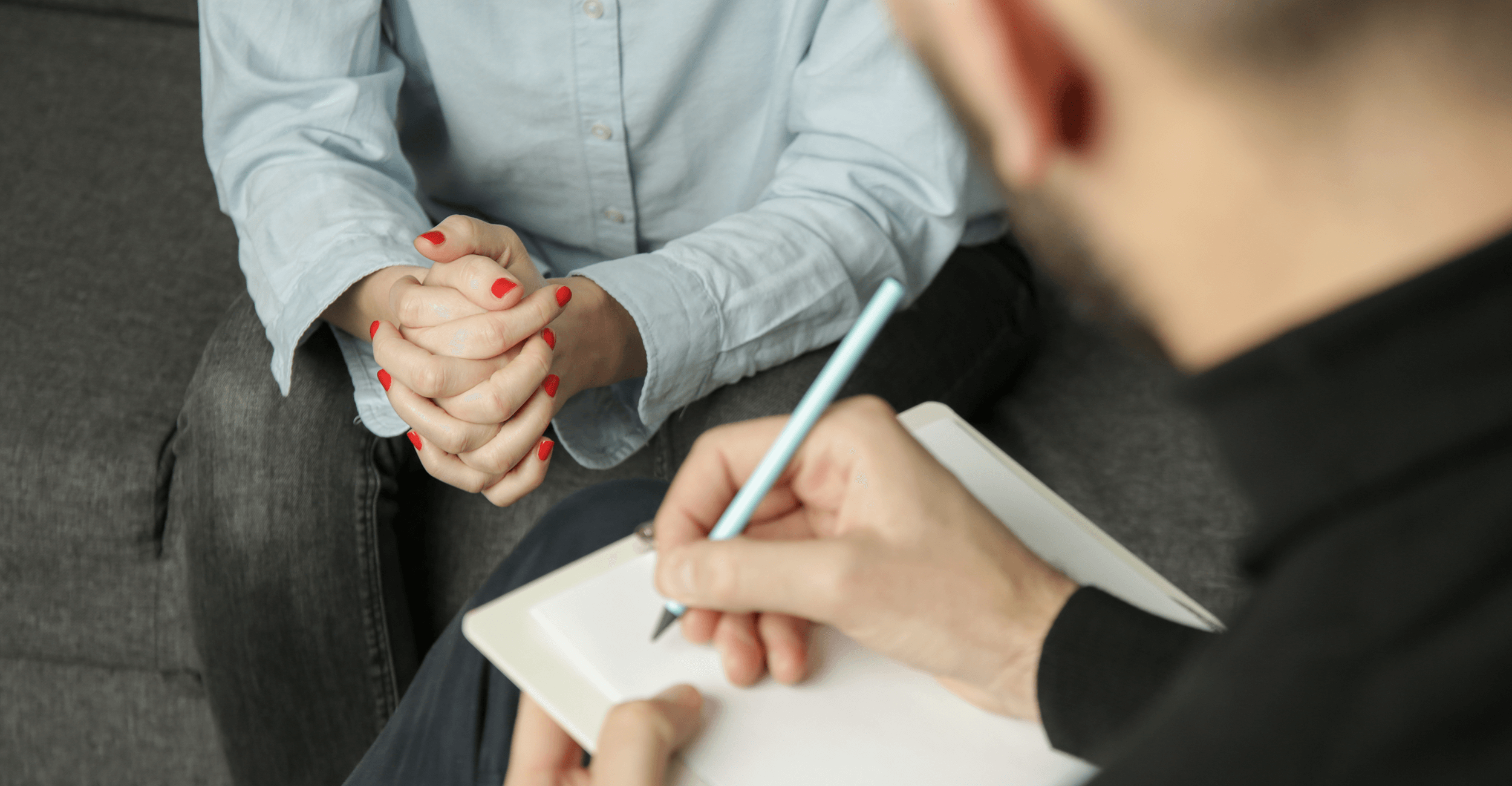 Young woman talking to her therapist.