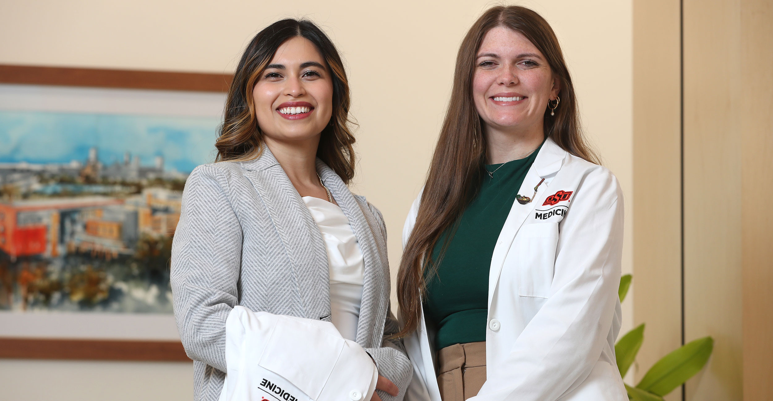 Schweitzer Fellowship recipients Madison Tytanic (right) and Carleen Perez at the OSU Center for Health Sciences.