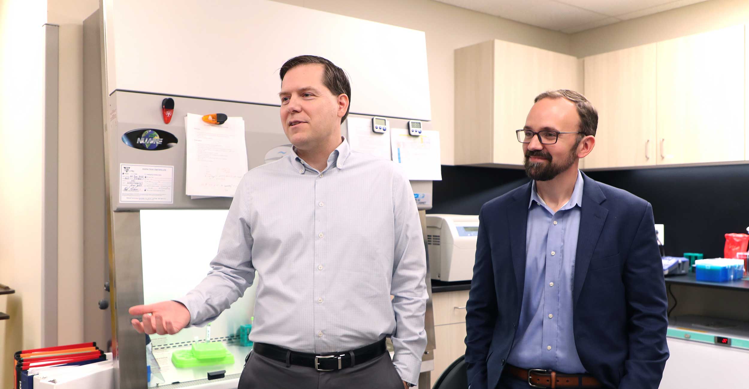 Dr. Kyle Simmons (left), Ph.D., and OSU-CHS professor of pharmacology and physiology, and Dr. Jesse Richards, assistant professor of medicine at OU-TU School of Community Medicine, discuss their research collaboration studying how semiglutide may be used to treat alcohol use disorder at the Hardesty Center for Clinical Research and Neuroscience in Tulsa.