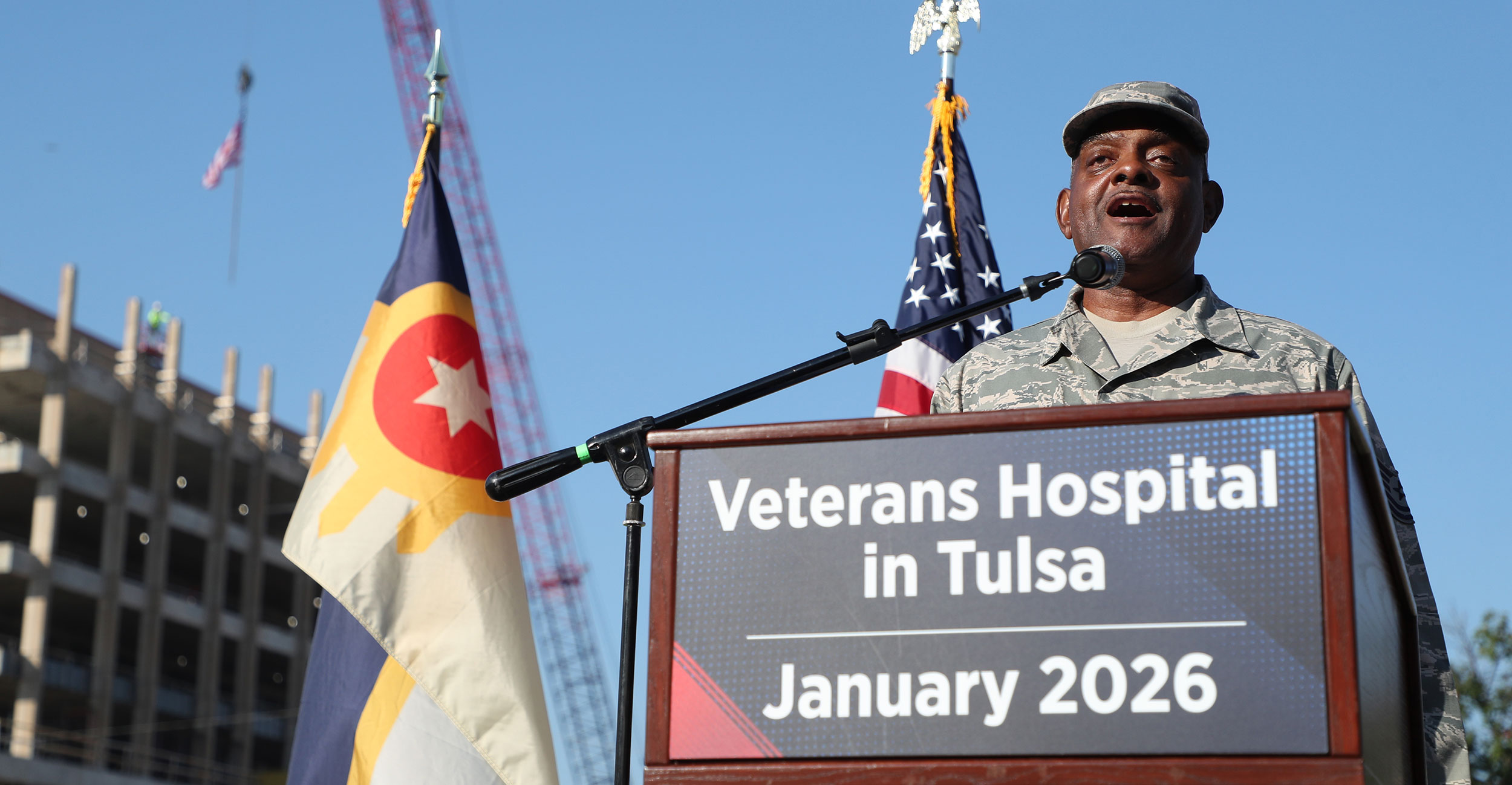 U.S. Air Force veteran Cesar Latimer sings the national anthem at the topping off ceremony for the Veterans Hospital in Tulsa (VHiT) on Aug. 27, 2024.
