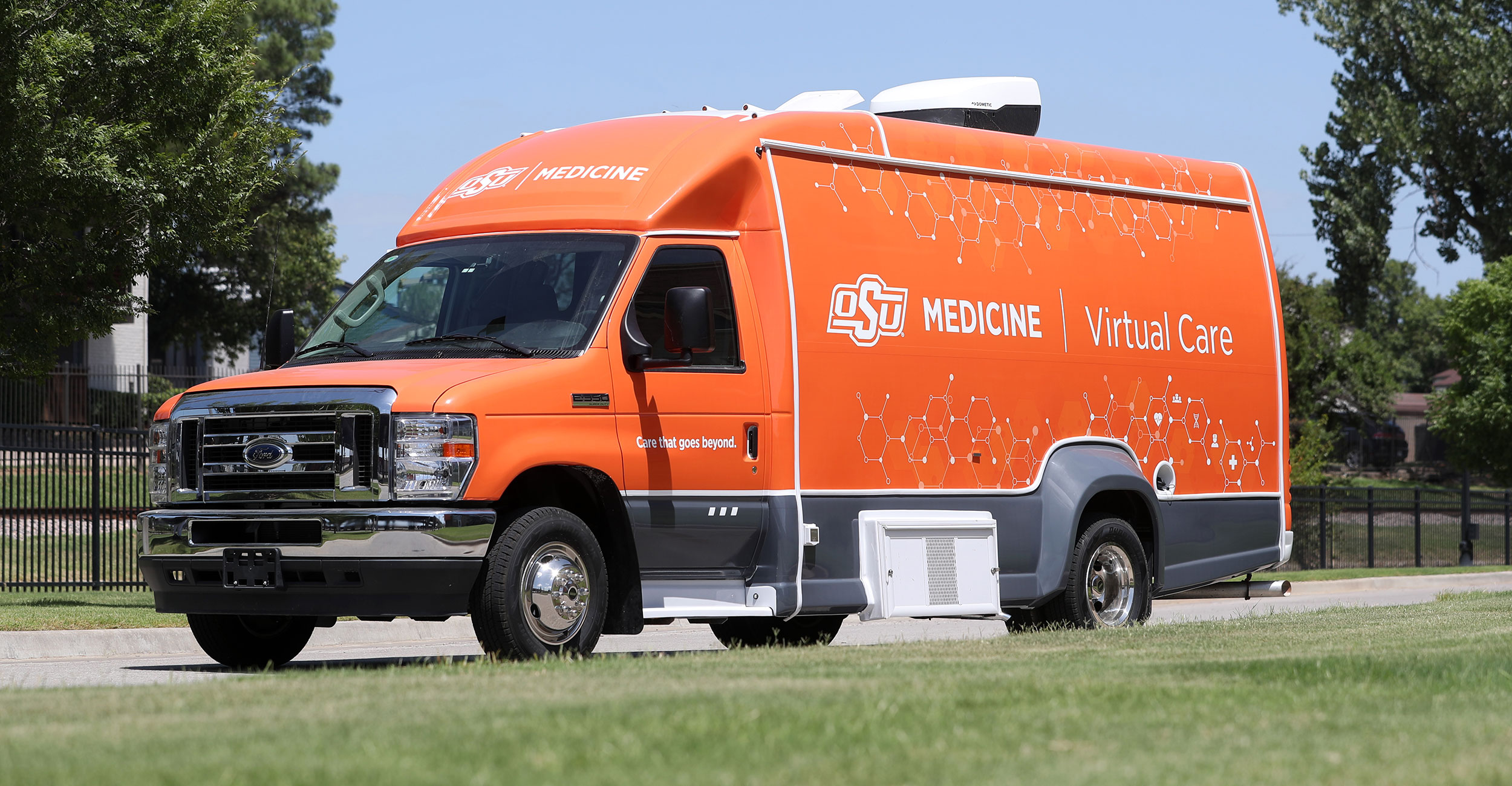 The OSU Medicine mobile Virtual Care Clinic van parked outdoors.