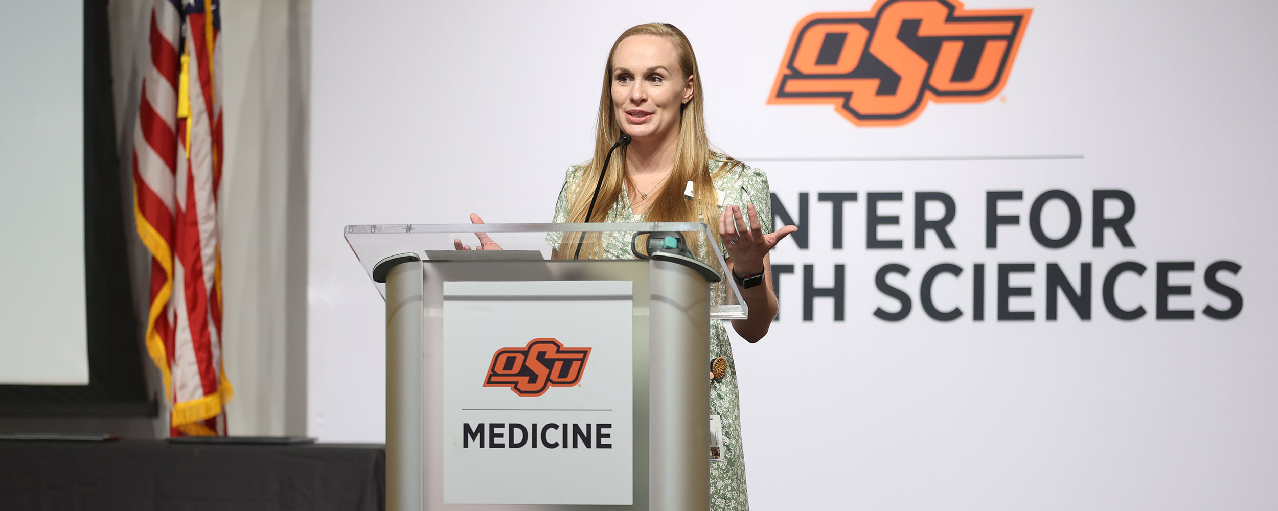 Kelsey Ashwood, employee wellness coordinator, speaking during the Department of Wellness Innovator Appreciation Lunch.