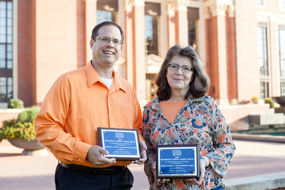 Dr. Alex Bishop(left) and Dr. Tanya Finchum(right) holding their Elizabeth B. Mason Major Project Awards