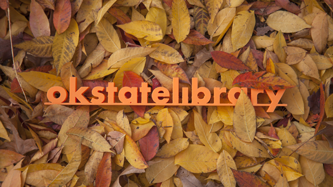 "okstate library" 3d print in pile of autumn colored leaves