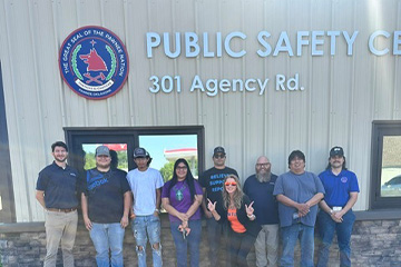 Group of people in front of the Pawnee Nation