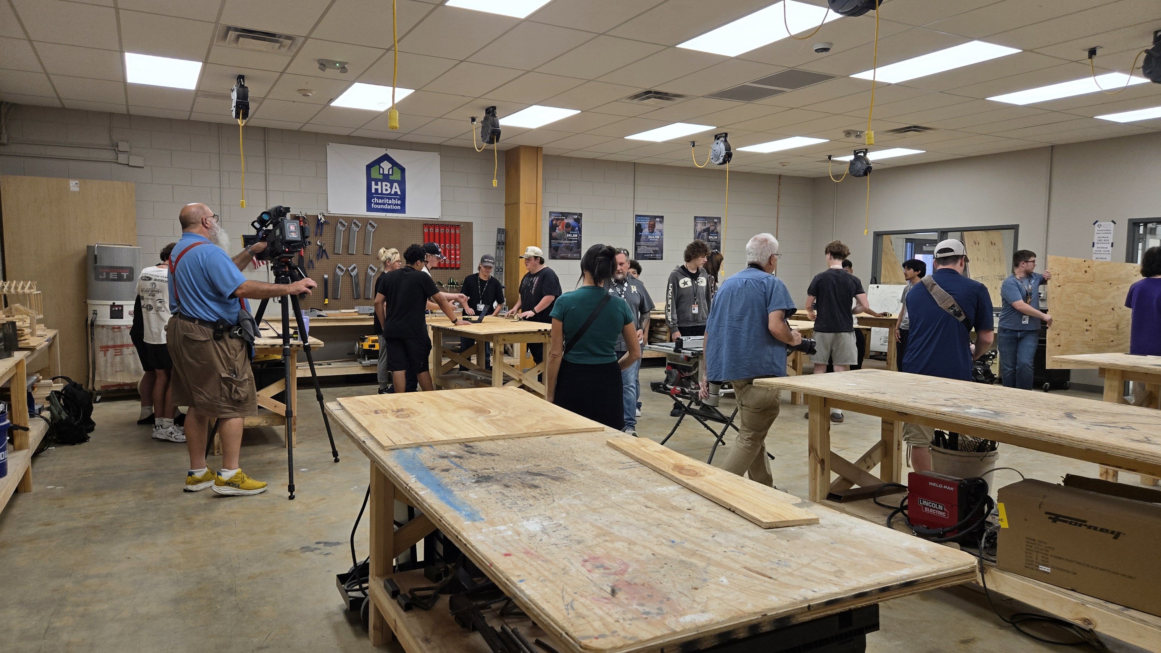 Students work in a classroom.