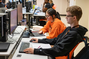 Students work in a computer lab.