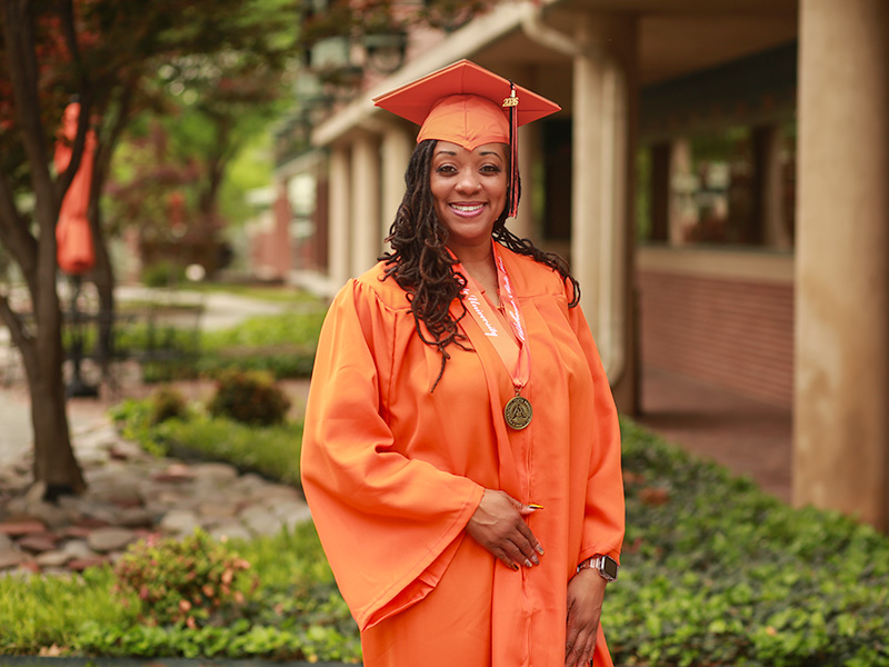 ‘Delayed does not mean denied’ – graduate earns Orange Gown distinction through dedication and focus